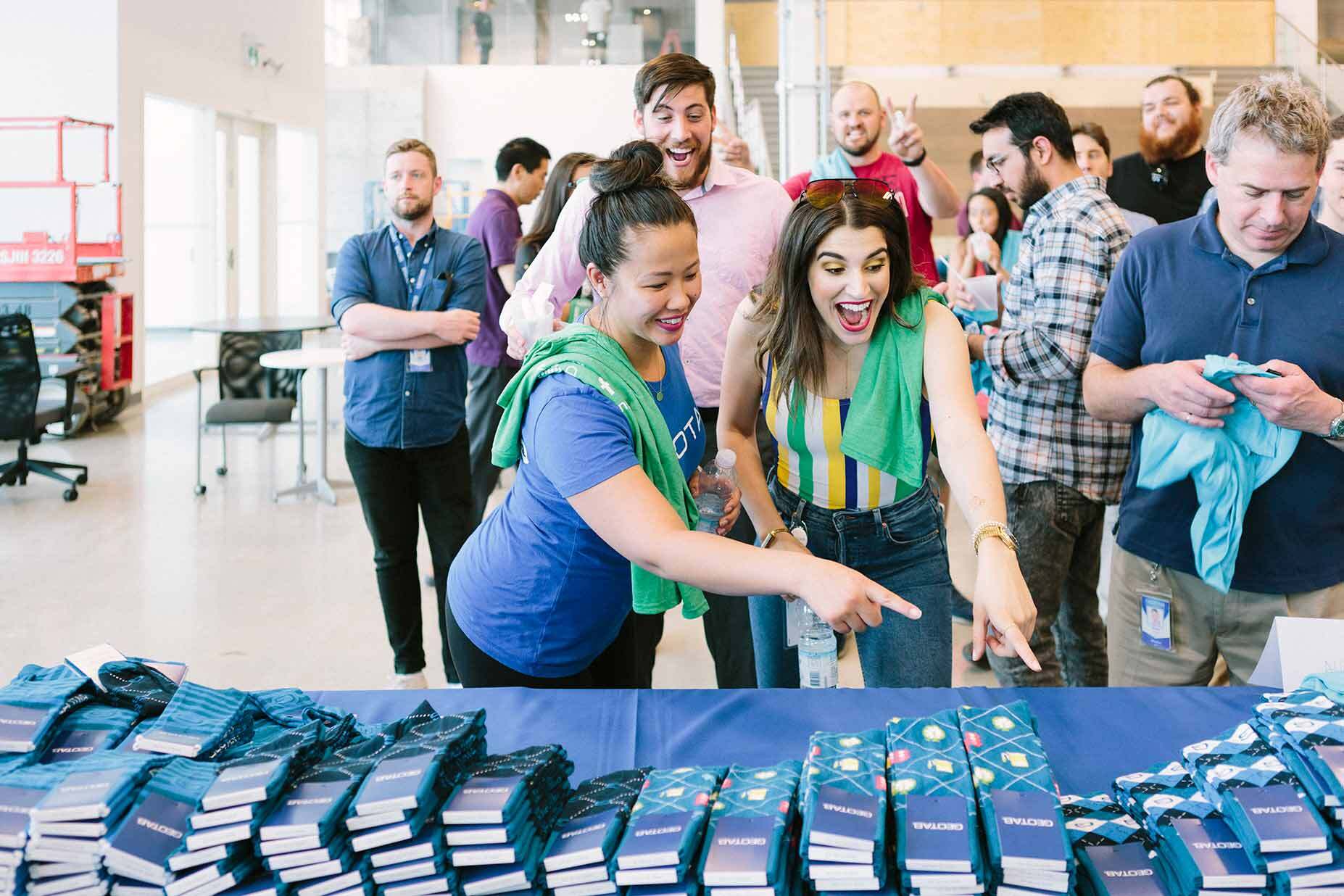 Diverse group of Geotabbers at a social event.