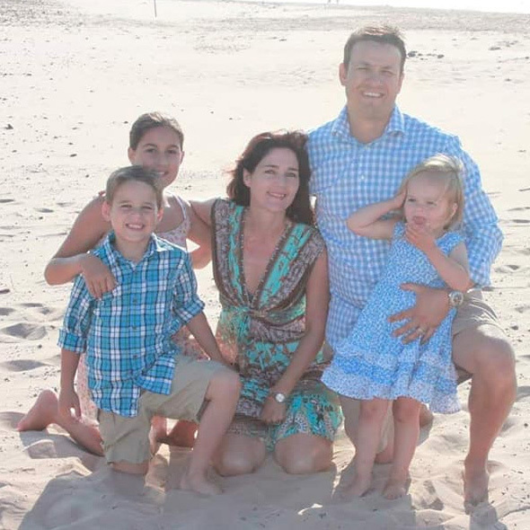 Lindy Theron with her family on the beach