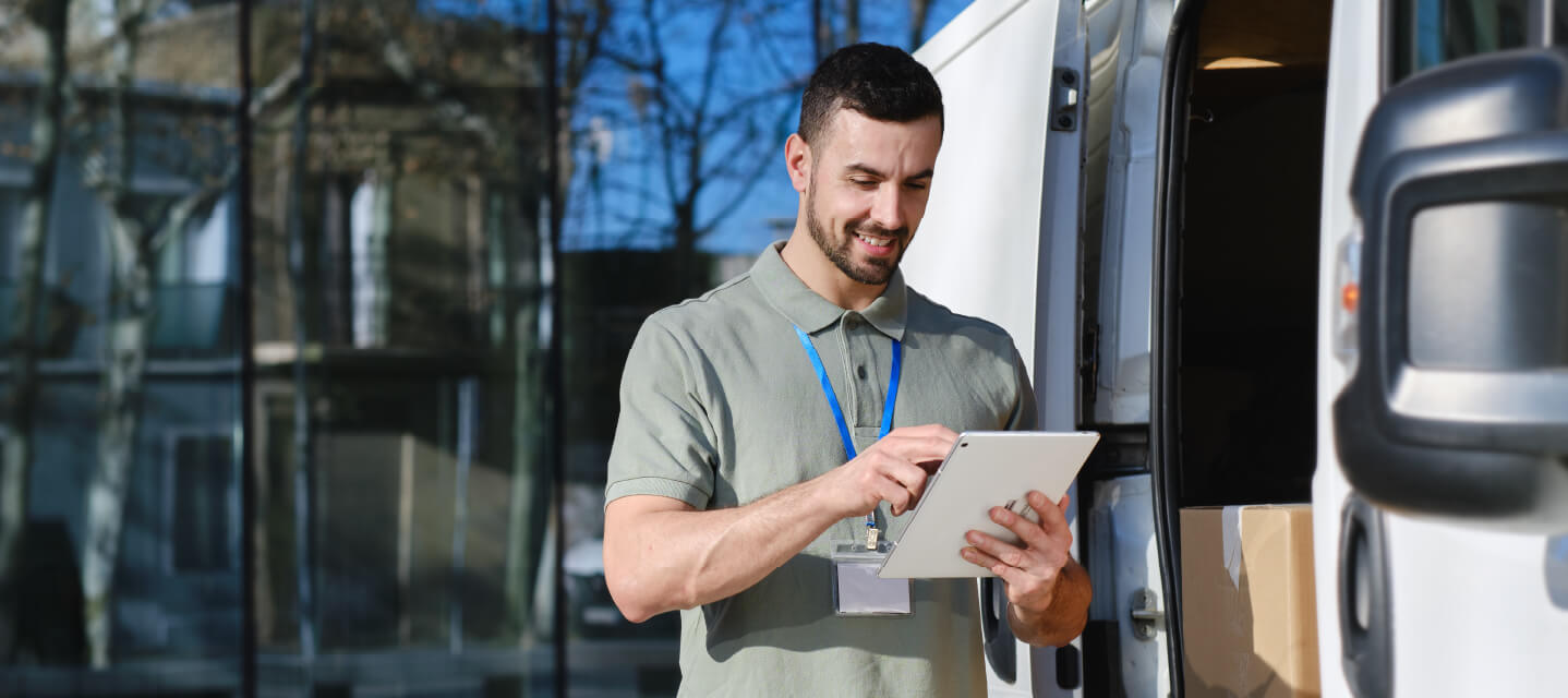 Photo of a field service manager using software.
