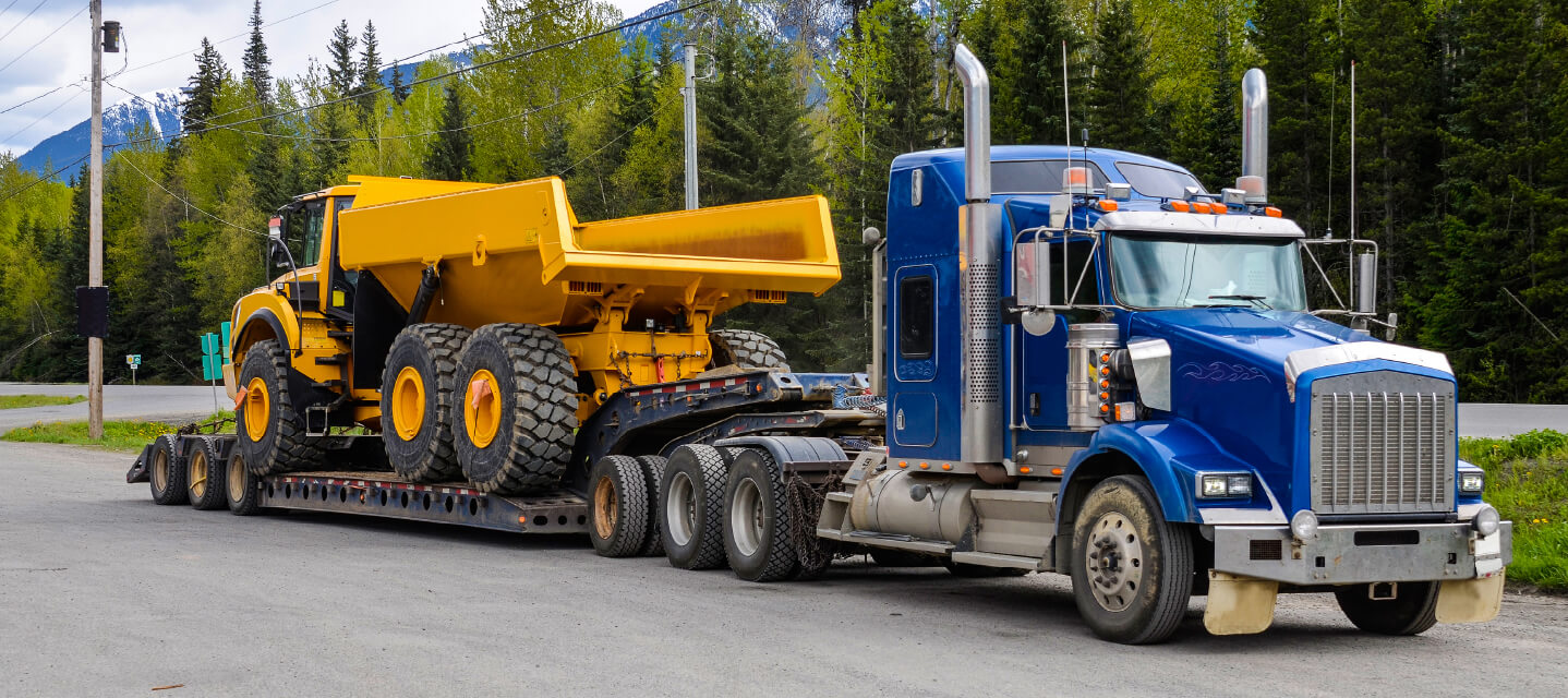 A photo of a heavy equipment transport.