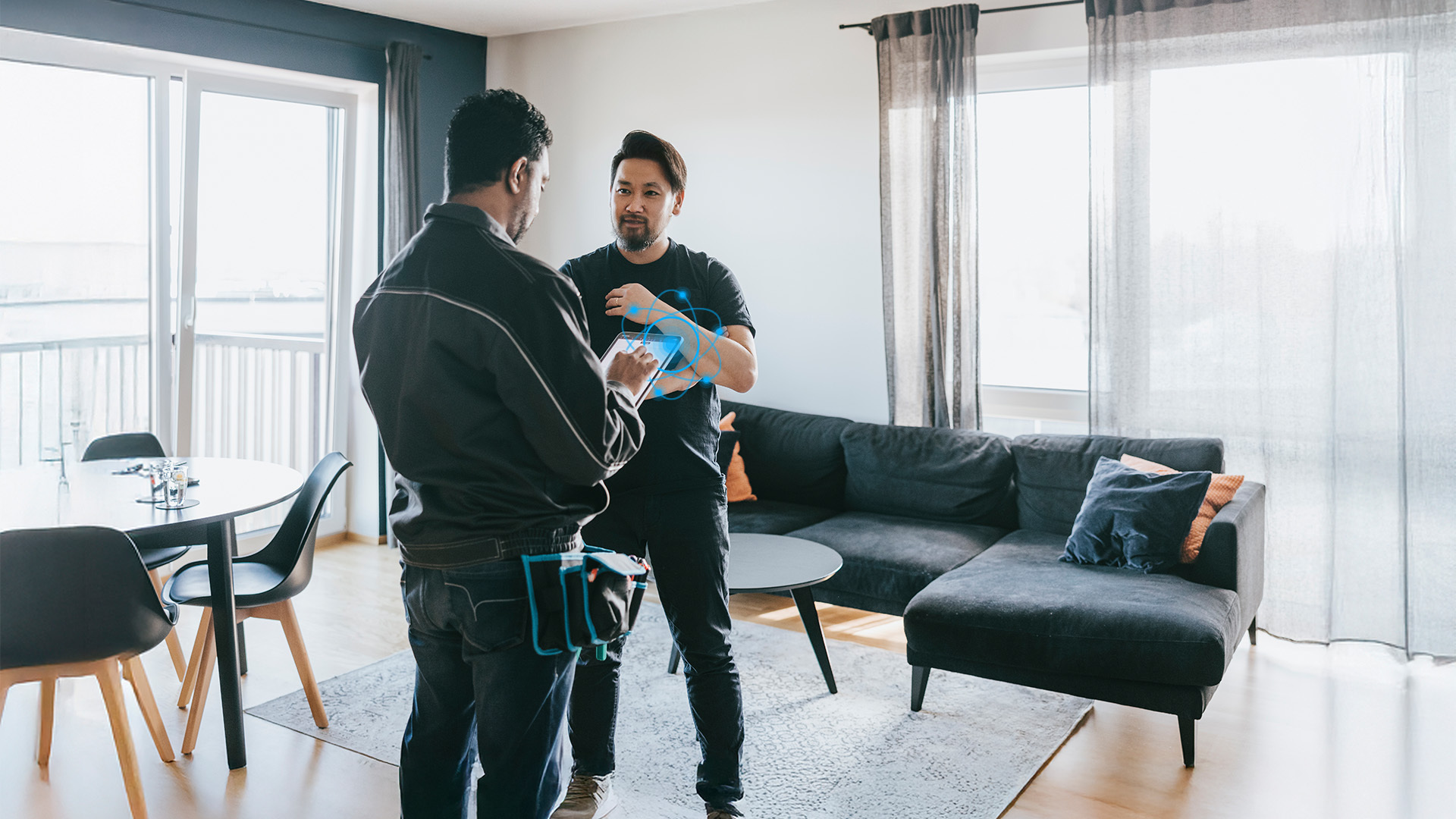two people talking to each other in a living room