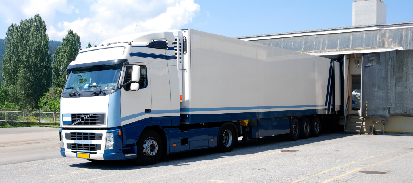 A climate controlled cold chain logistics truck being loaded.
