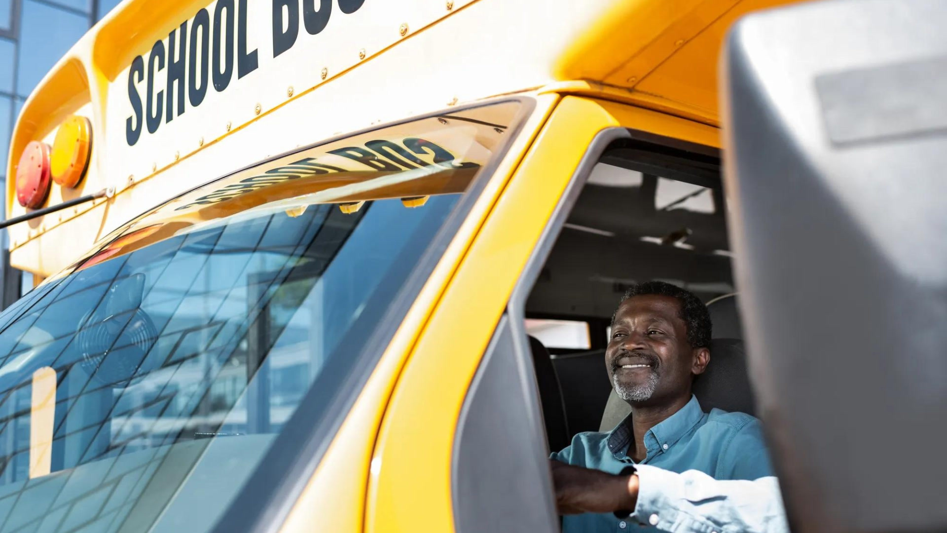School bus driver driving the bus
