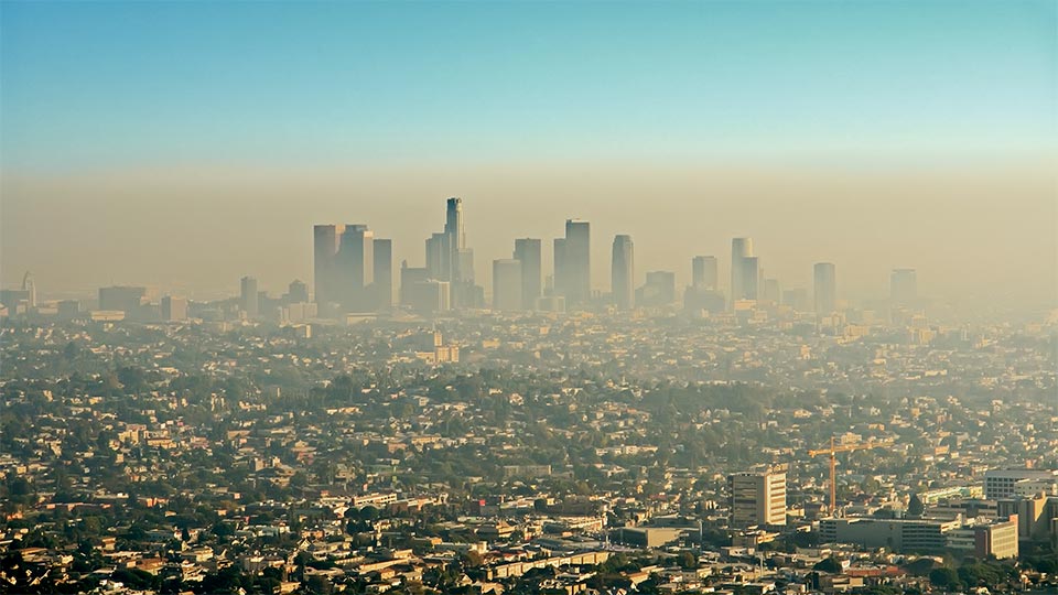 A view of a city covered in smog