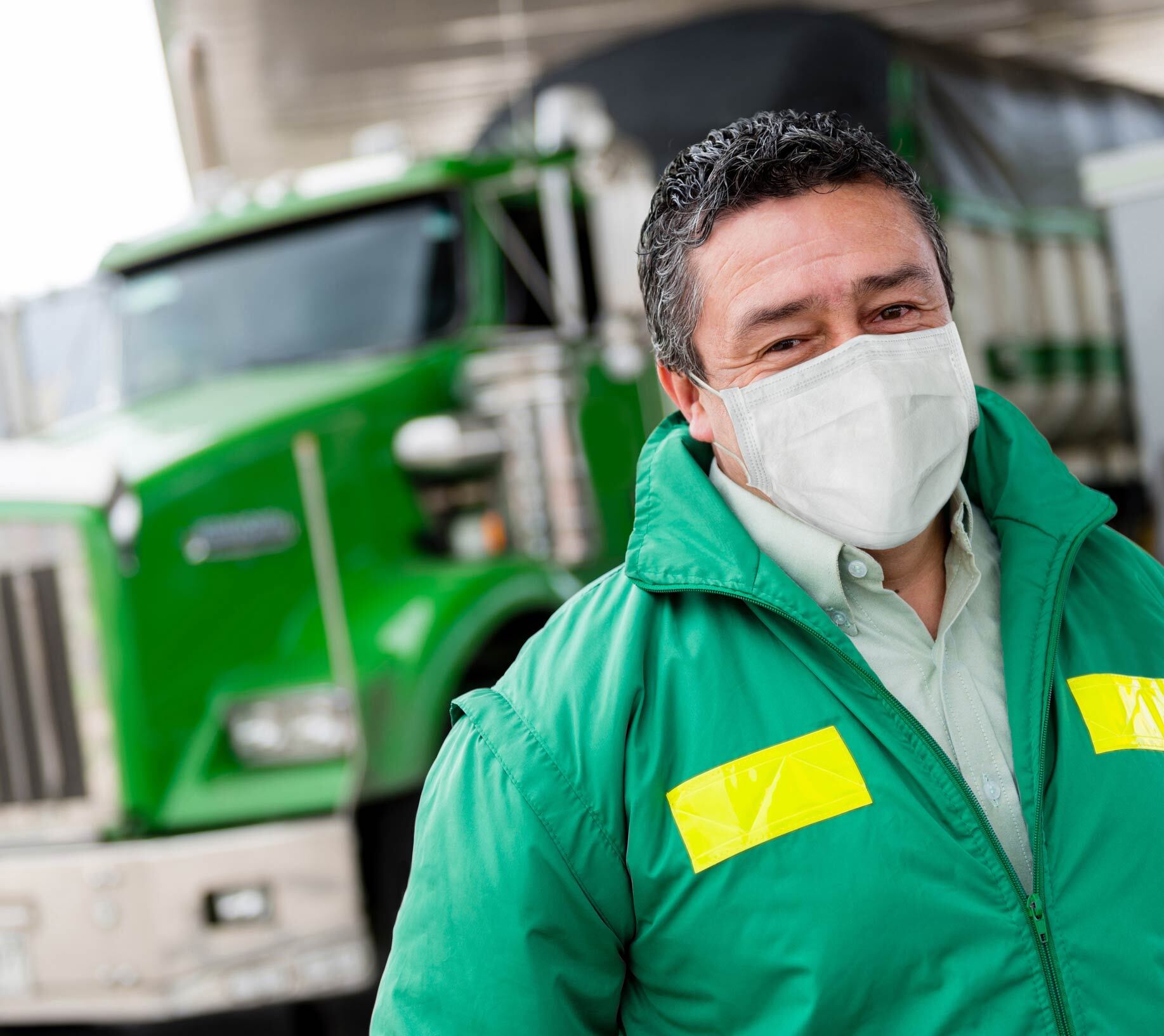 Truck driver wearing a mask