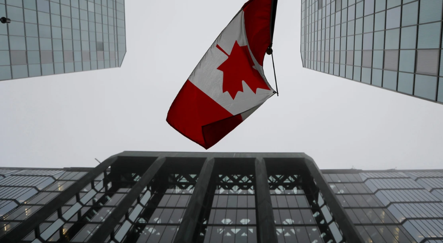 The Canadian flag near the Bank of Canada in Ottawa, Ont. Photo by David Kawai/Bloomberg files