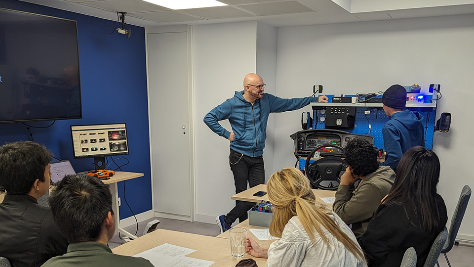 geotab employee teaching students about the product