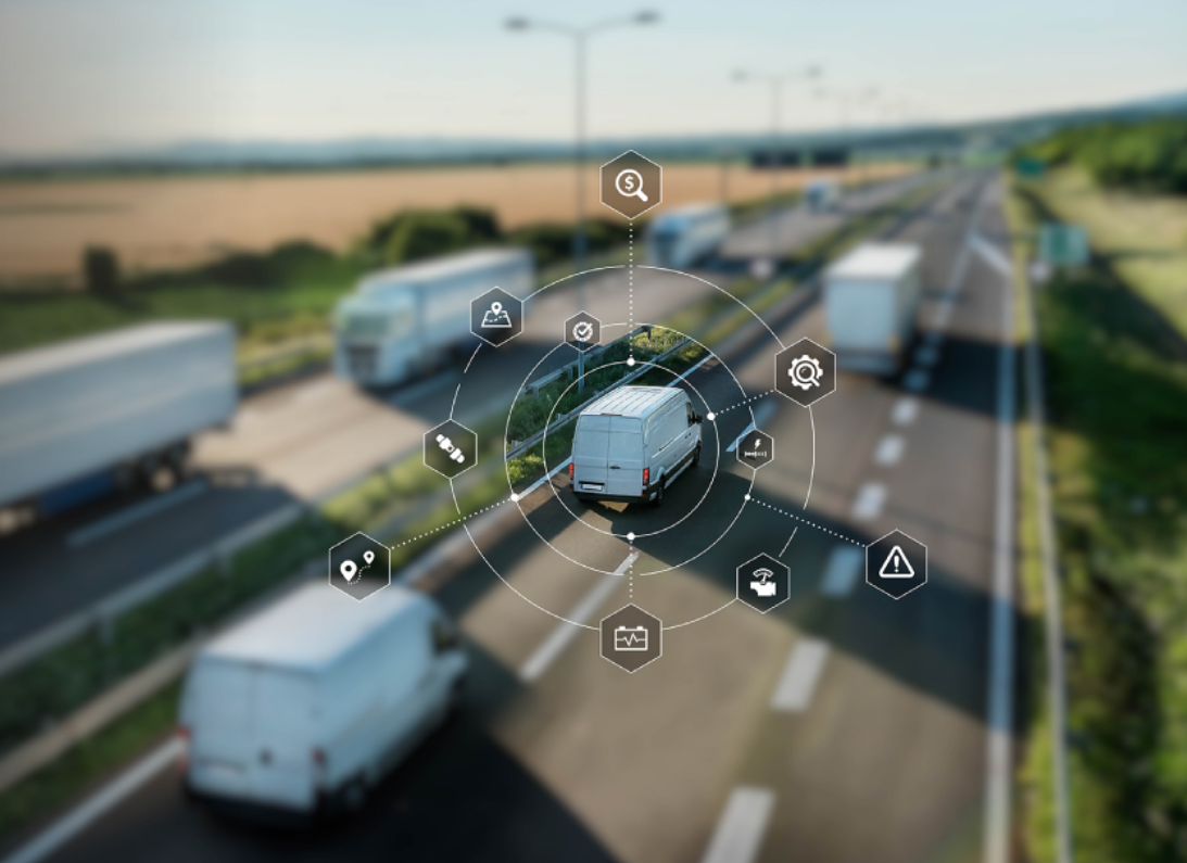 Vehículo comercial en carretera con iconos digitales representando monitoreo en tiempo real, telemática y seguridad de flotas.