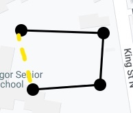 Definición de límites virtuales: mapa mostrando la creación de una geocerca rectangular alrededor de un área específica para el seguimiento GPS de vehículos.