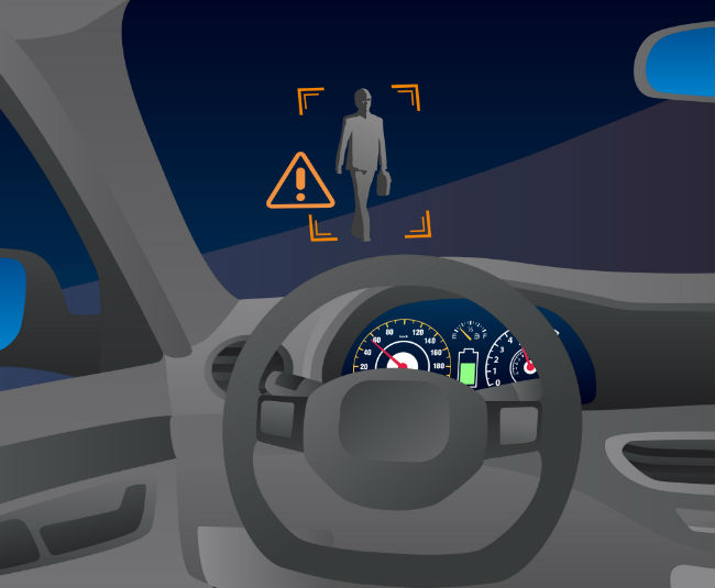 Ilustração interna de um carro com alerta de pedestre detectado à frente, destacando sistemas de assistência e segurança veicular.