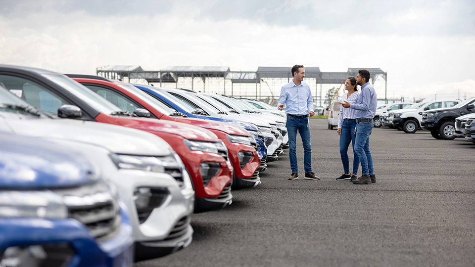 row of rental cars parked