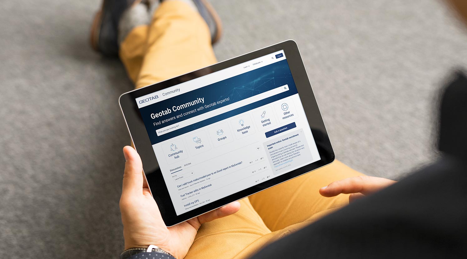 A person visiting the Geotab Community on their tablet